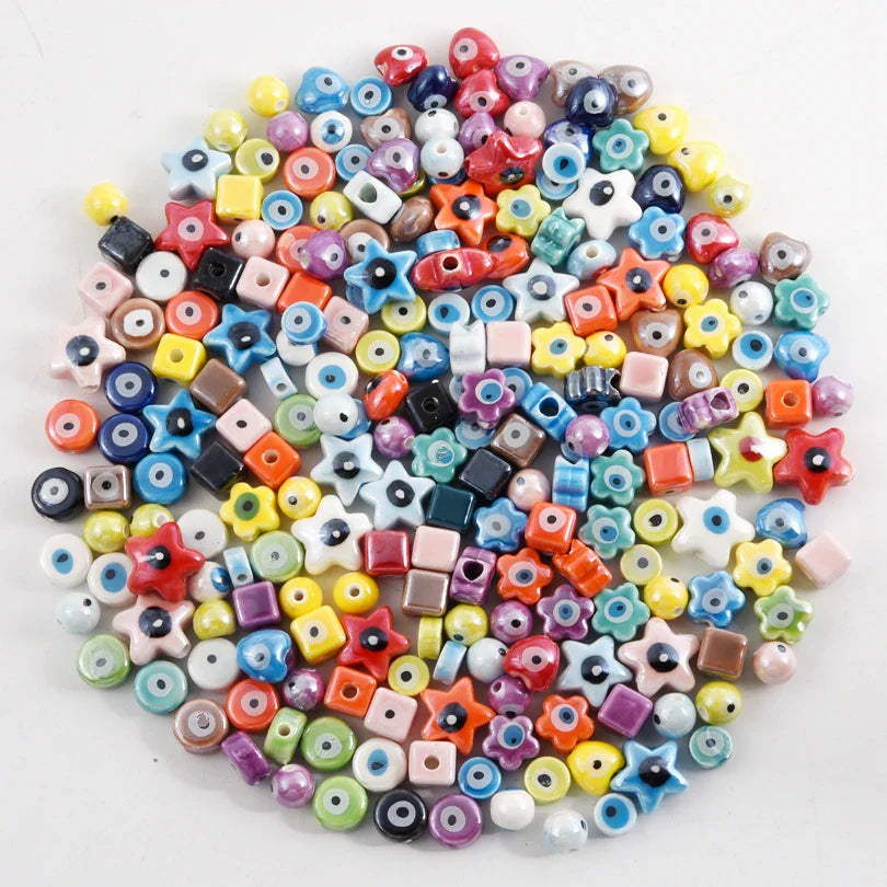 10/20/30PCS Colorful Ceramic Animal Beads – 2mm Hole Clownfish, Turtle, Star & Conch Shell for DIY Jewelry, Bracelets & Crafts