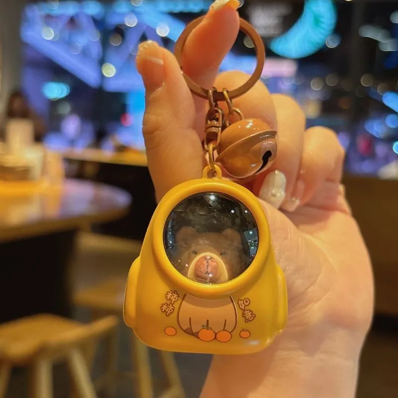 IFYOUOO Luminous Capybara Keychain — Cute Cartoon Space Capsule Keyring for Bags & Gifts