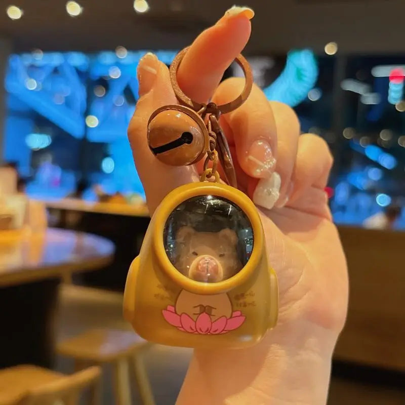 IFYOUOO Luminous Capybara Keychain — Cute Cartoon Space Capsule Keyring for Bags & Gifts