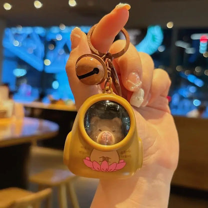 IFYOUOO Luminous Capybara Keychain — Cute Cartoon Space Capsule Keyring for Bags & Gifts