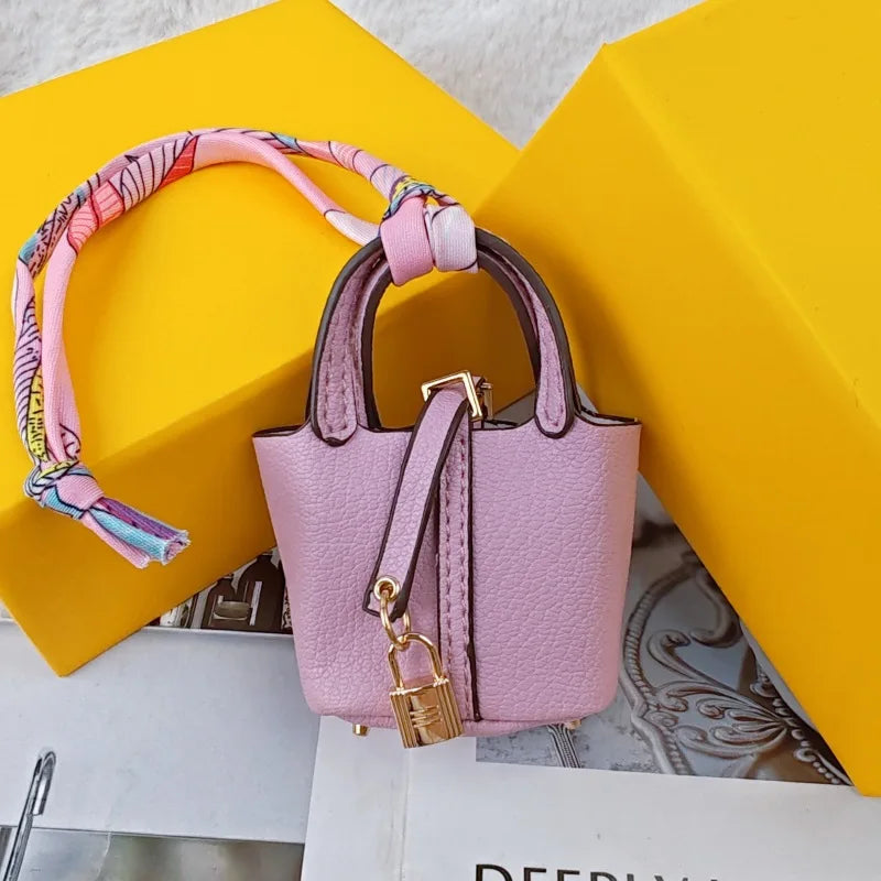 Mini Bag Pendant Keychain – Creative Portable Zero Wallet, Bracelet, and Bluetooth Earphone Multifunctional Hanging Accessory