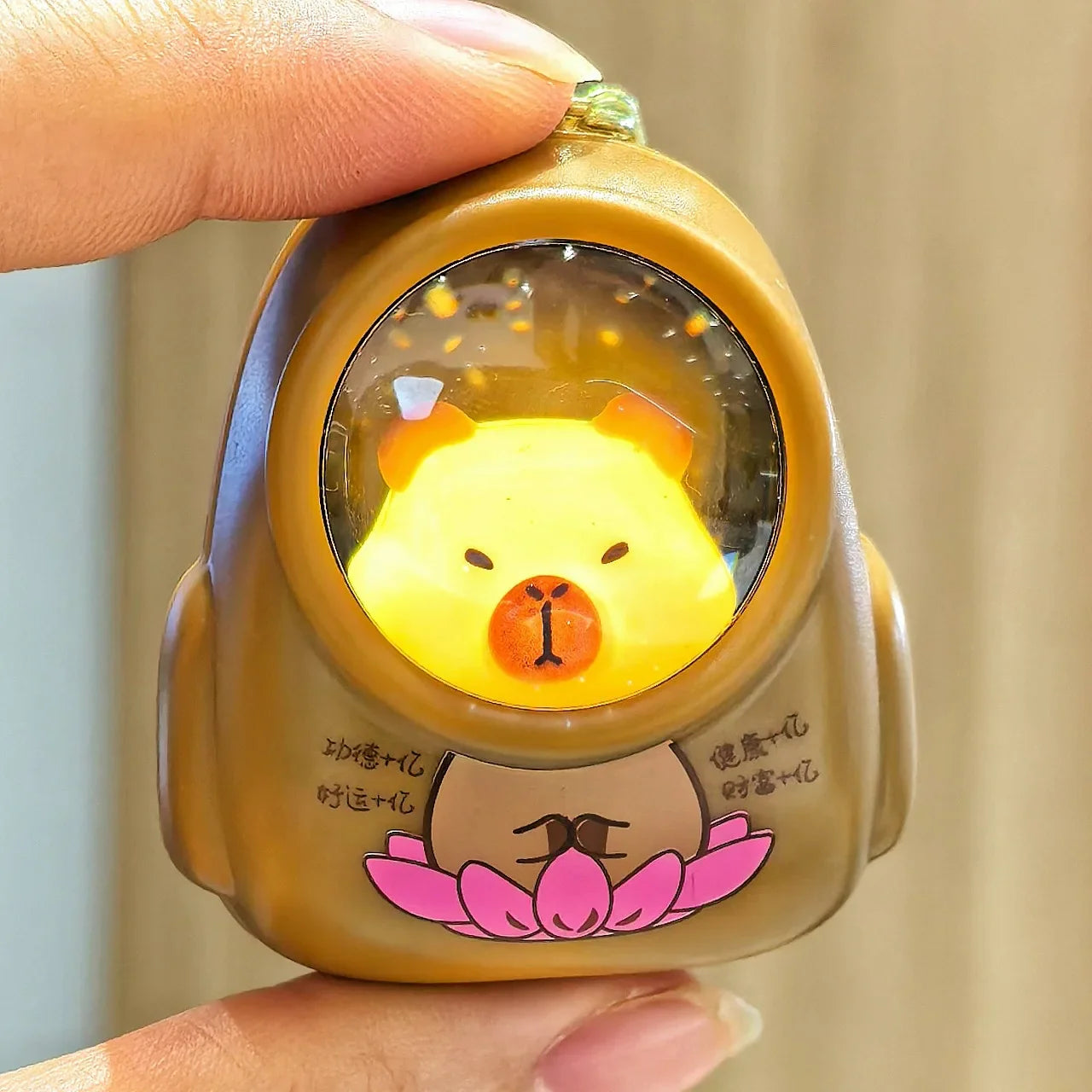 IFYOUOO Luminous Capybara Keychain — Cute Cartoon Space Capsule Keyring for Bags & Gifts