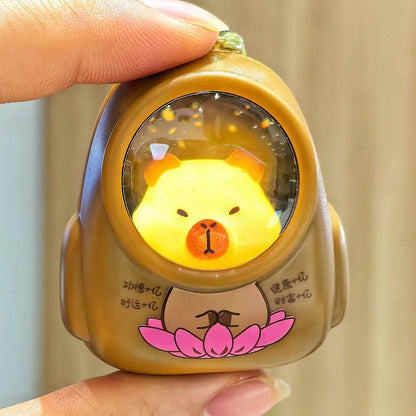 IFYOUOO Luminous Capybara Keychain — Cute Cartoon Space Capsule Keyring for Bags & Gifts