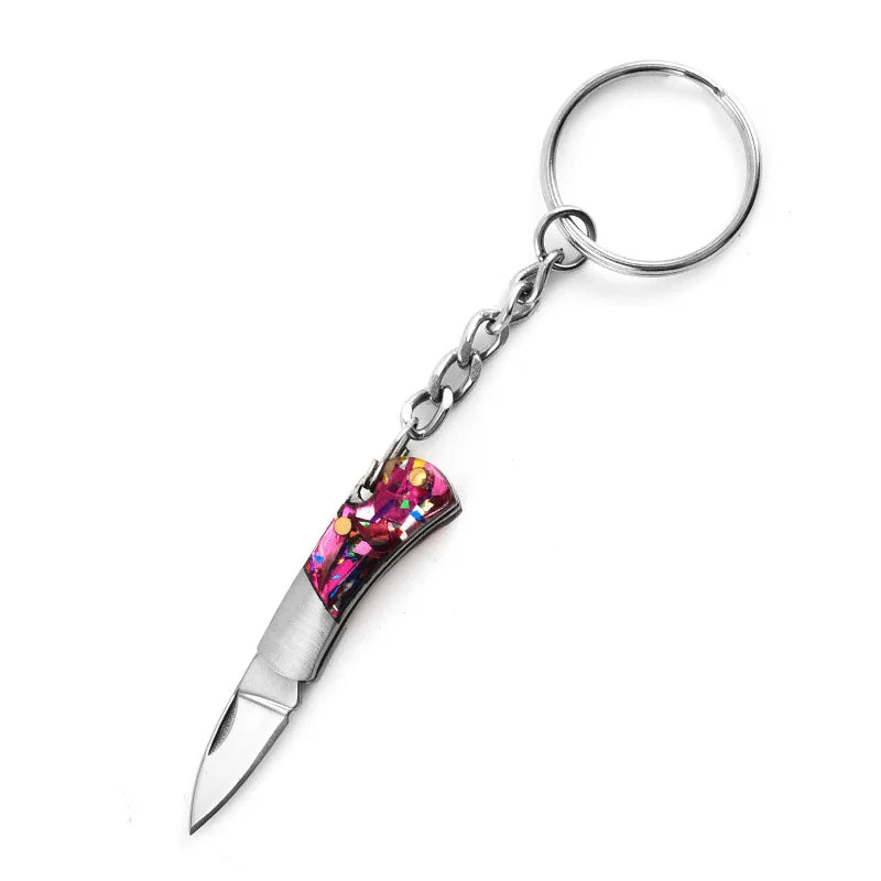 5cm Mini Folding Knife Keychain – Acrylic & Brass Portable Blade Pendant for Camping, Outdoor, and Everyday Carry