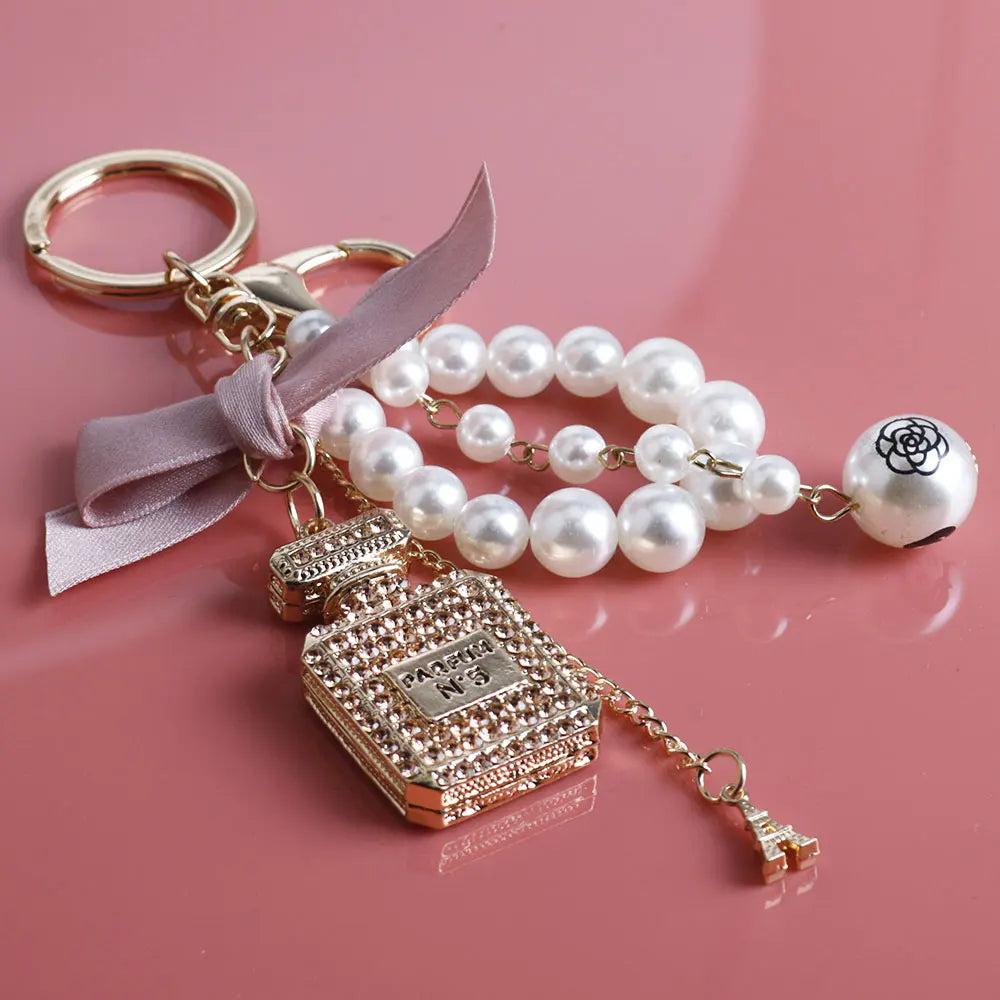 Fashion Pearl Perfume Bottle Keychain — Cute Bow Car & Bag Charm for Women, Creative Key Ring Accessory