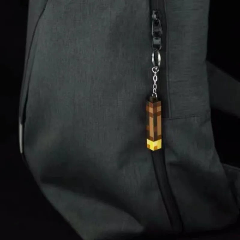 Glow-in-the-Dark Anime Gamer Keychain – Classic Torch Design with Pixelated Wooden Texture Plastic Pendant