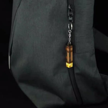 Glow-in-the-Dark Anime Gamer Keychain – Classic Torch Design with Pixelated Wooden Texture Plastic Pendant